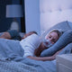 Woman sleeping with the F30i Standard System.