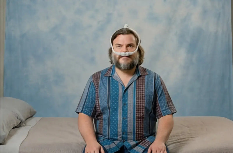 Jack Black wearing a CPAP mask, one of many celebrities with sleep apnea