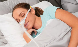 Woman-sleeping-using-cpap-mask