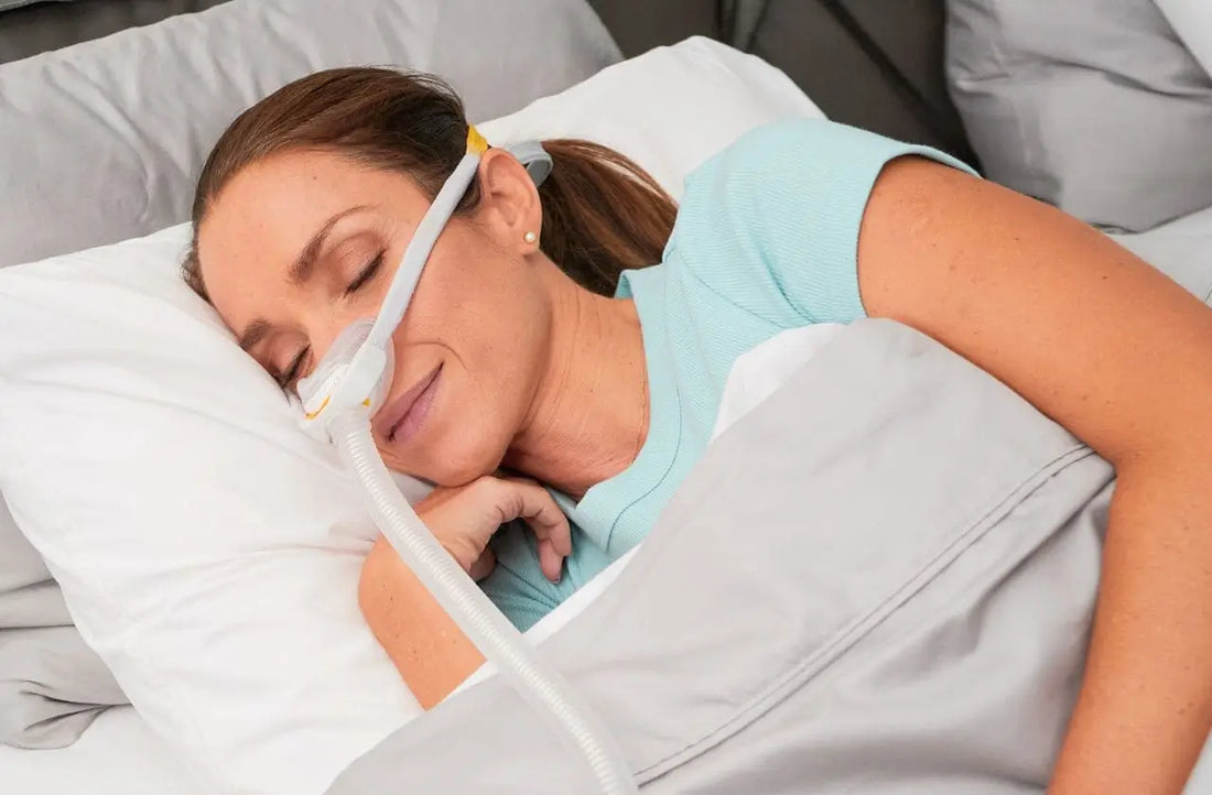 Woman-sleeping-using-cpap-mask