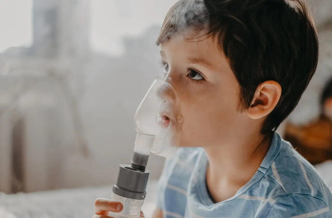 Kid using nebulizer