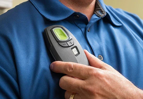A man wearing Inspire Sleep Apnea Device