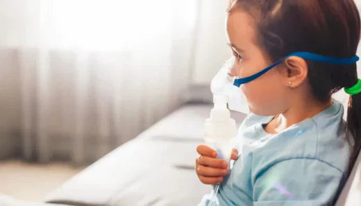 Child using nebulizer
