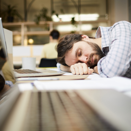 Man sleeping at work