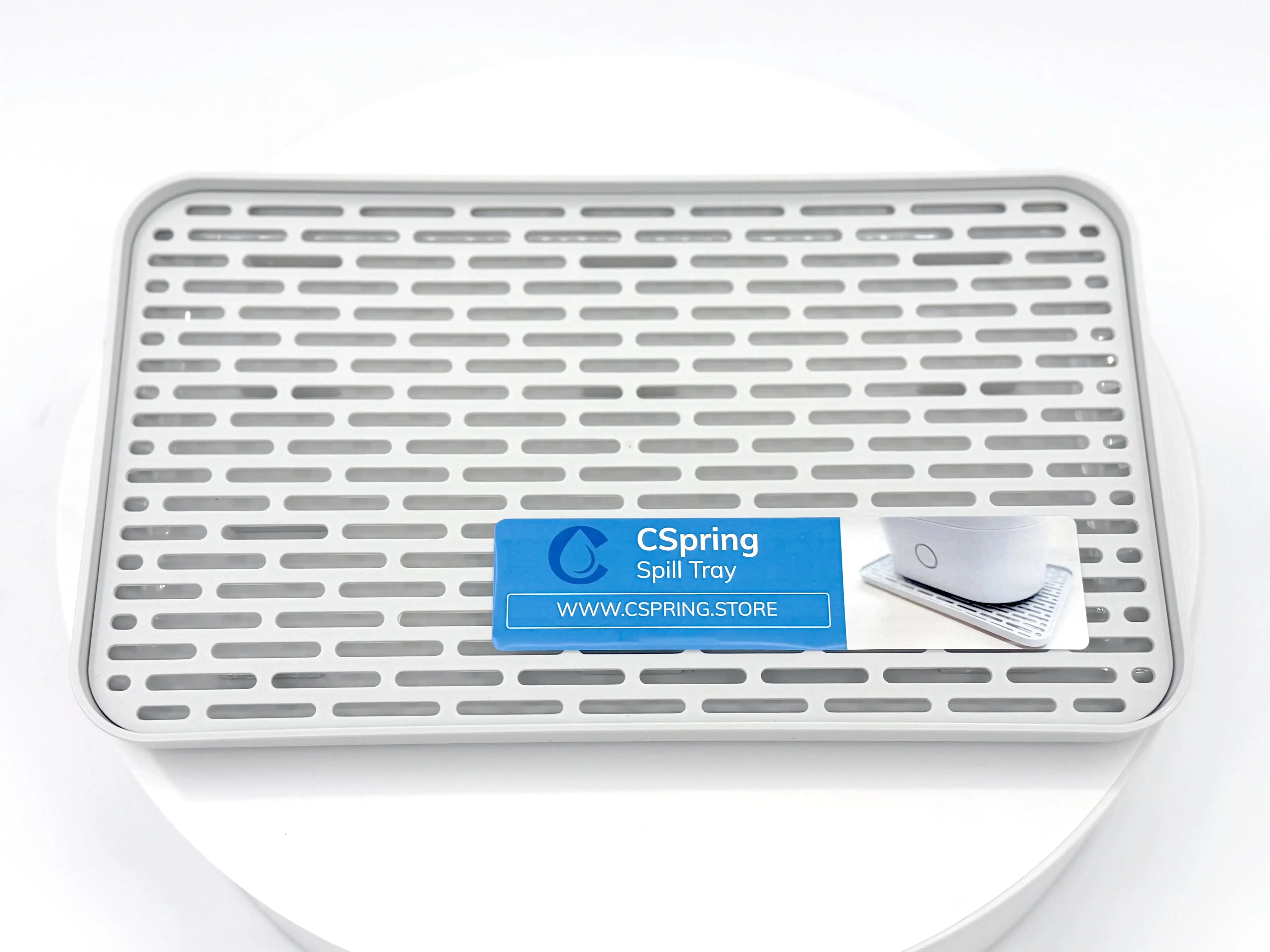 Spill protection tray for CPAP & CSpring
