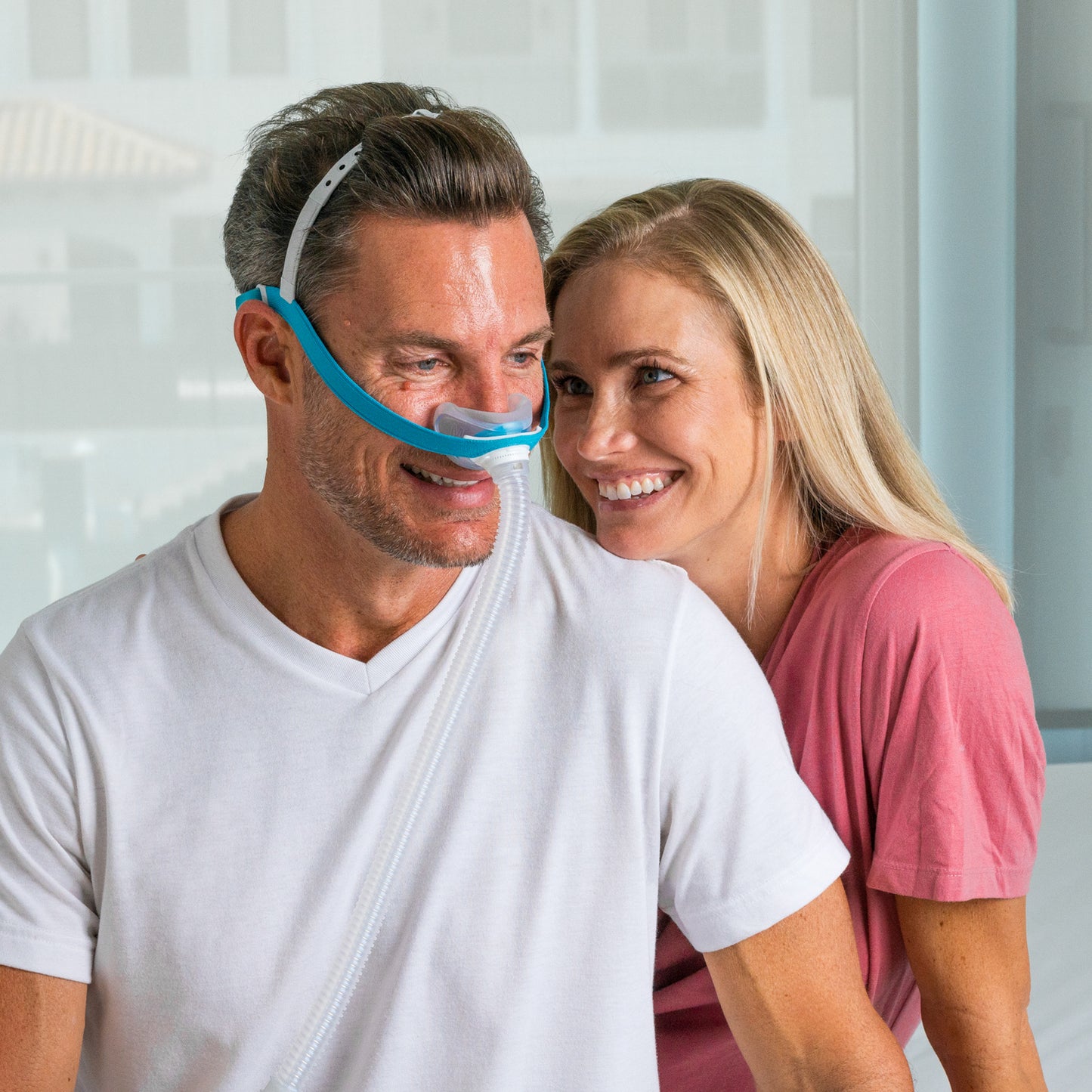 Couple with man wearing Evora nasal mask.