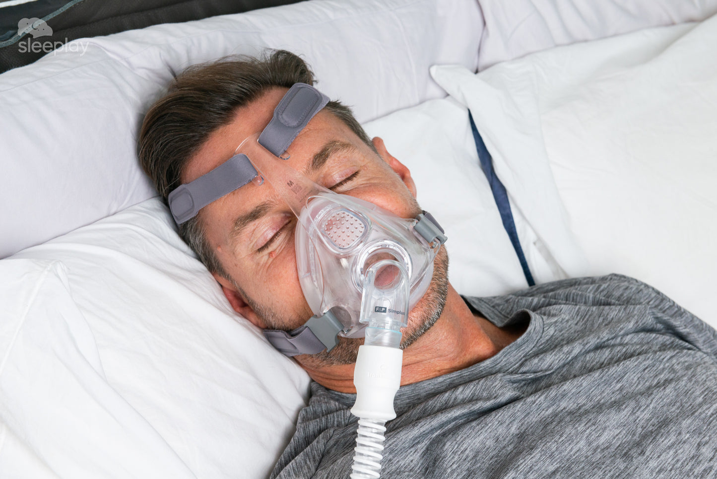 Sleeping with Simplus CPAP mask.