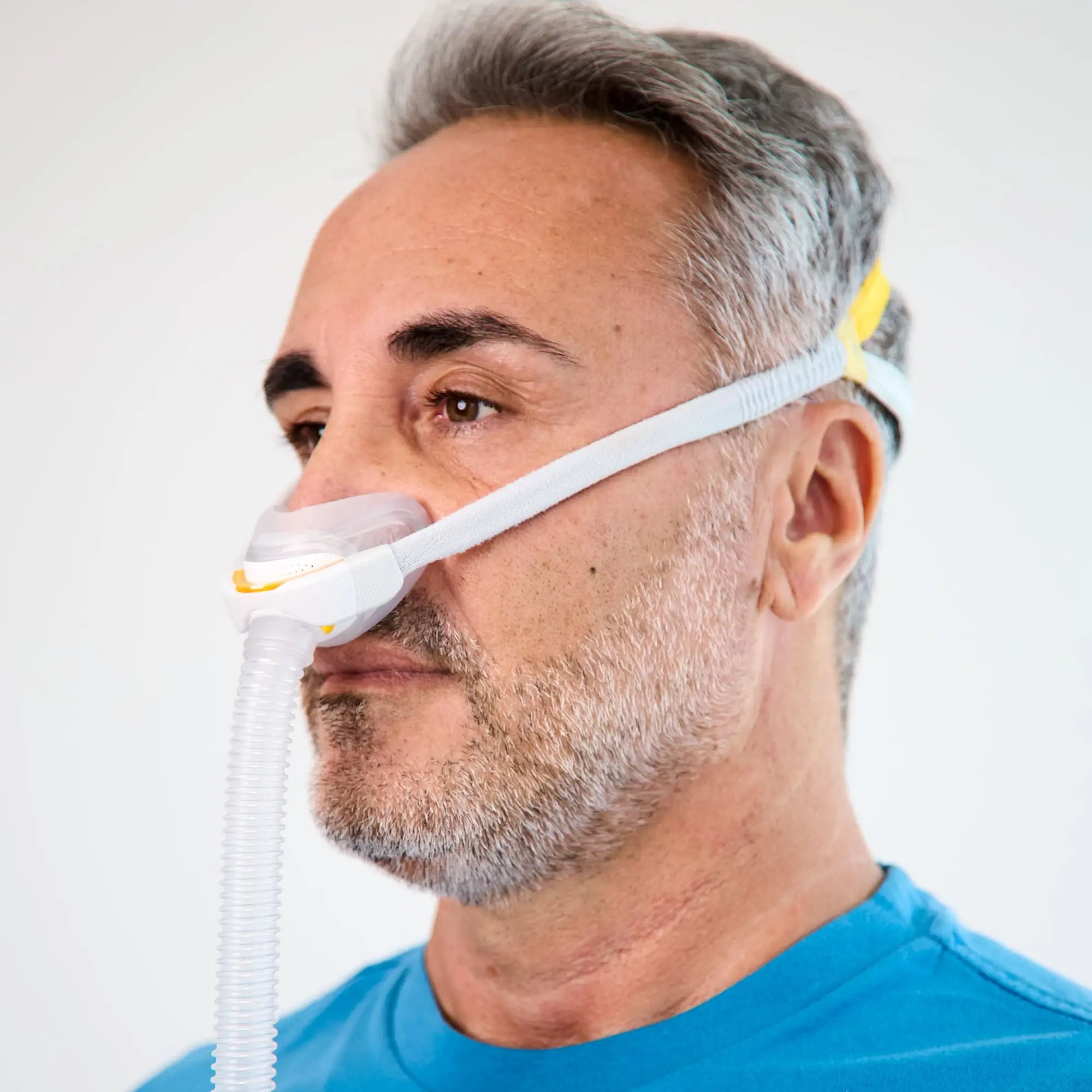 man using the solo nasal mask for cpap.