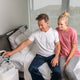 Couple using the Paptizer CPAP cleaner.