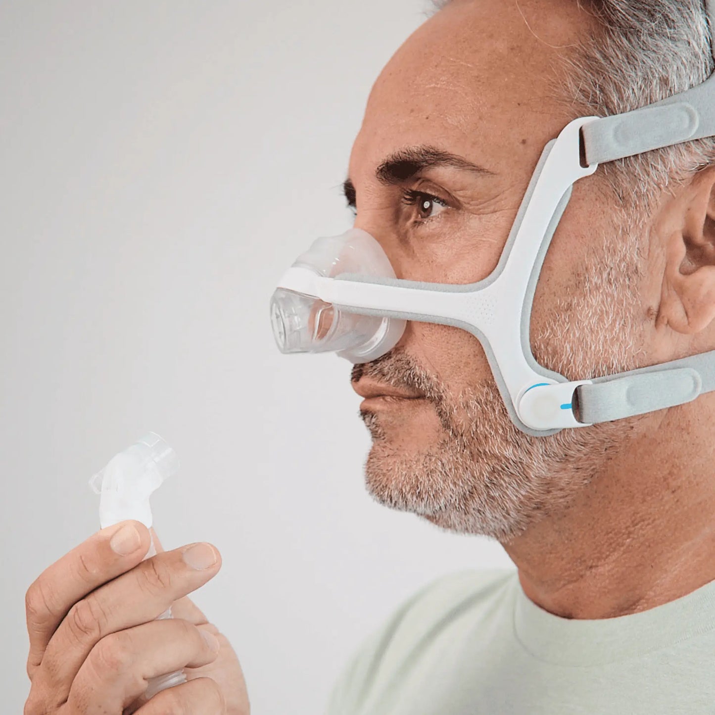 Man adjusting AirFit N20 Airfit N20 Complete Mask System