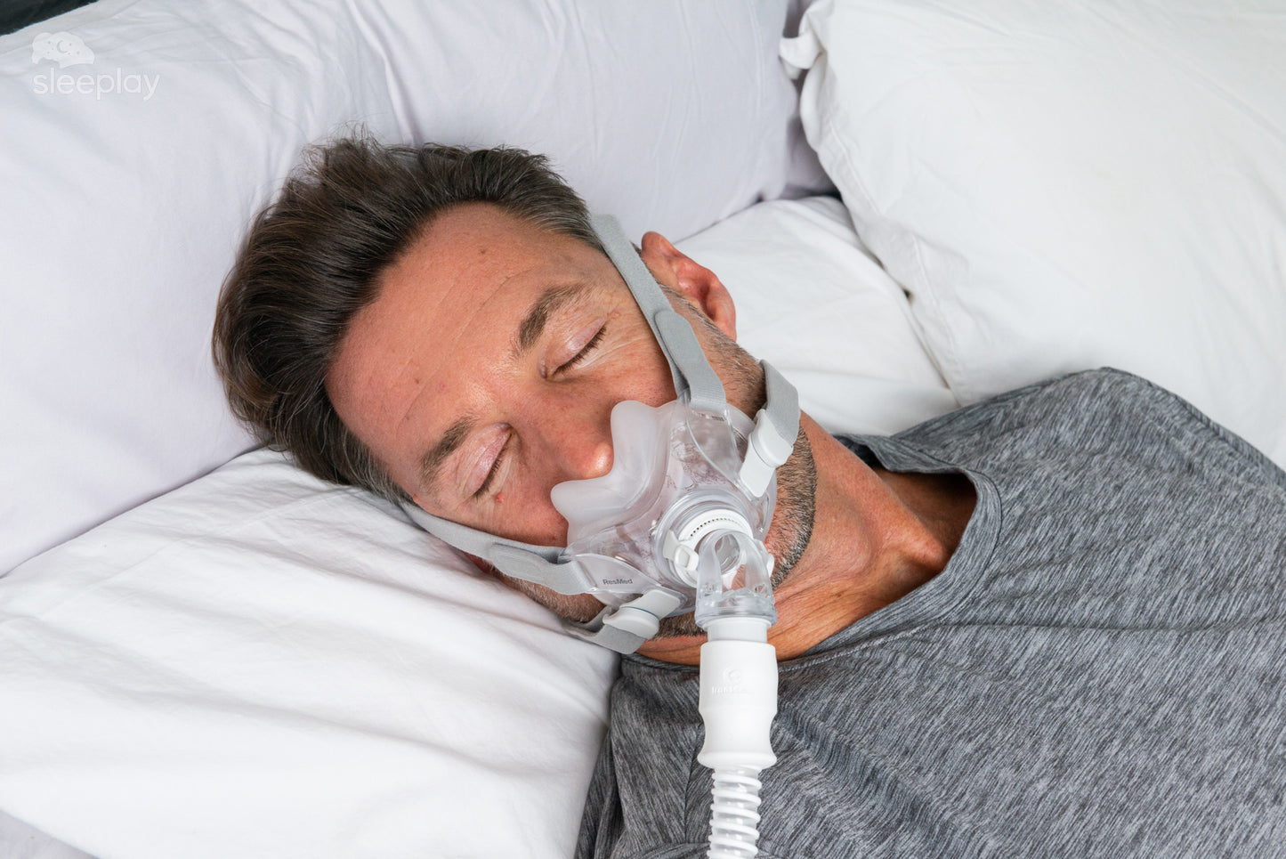 Man sleeping with AirFit F30.
