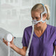 Woman wearing CPAP mask using Transcend micro