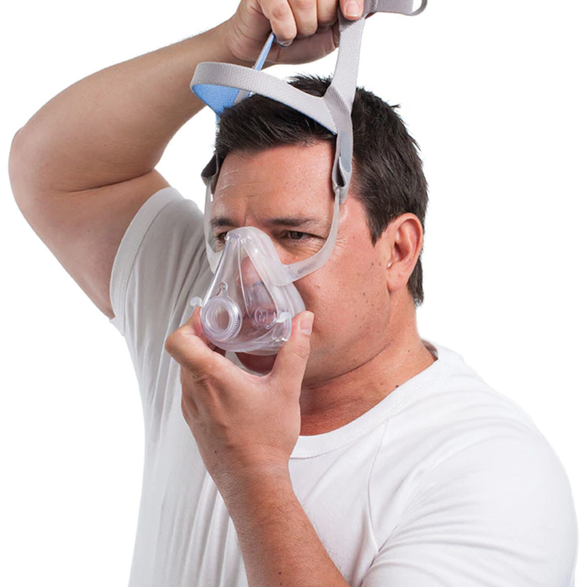 Man putting ResMed AirFit™ F10 Full Face CPAP Mask with Headgear