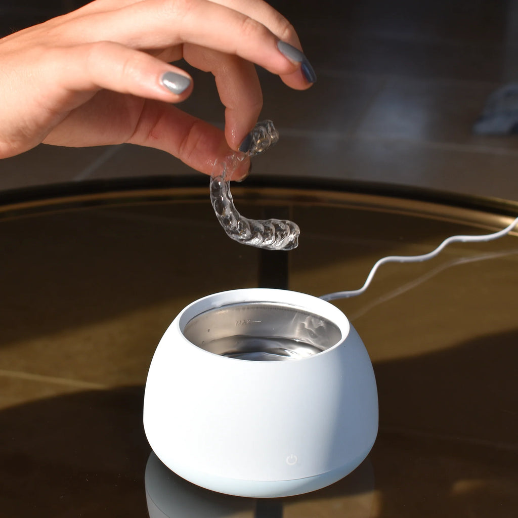 cleaning aligners with the Zima Dental Pod Ultrasonic Cleaner