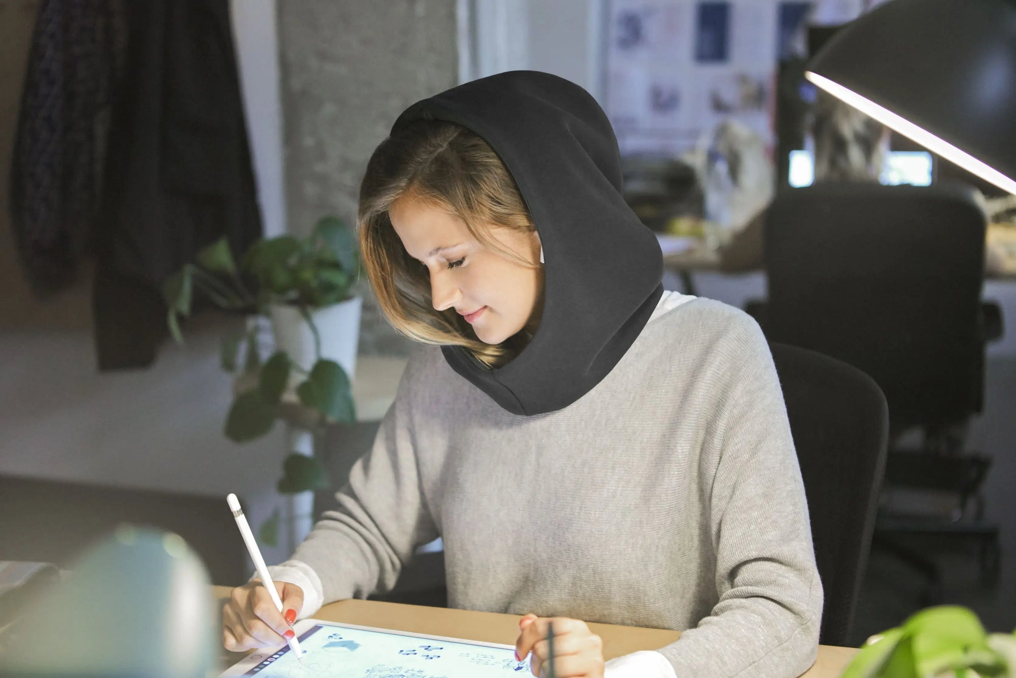 Woman On Ipad With Hood.