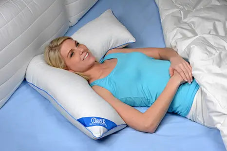 woman using the L Shaped Body Pillow Contour