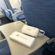 CPAP Travel Battery Explore Mini powering an AirMini machine on a plane