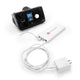 CPAP Travel Battery Explore Mini in a travel setup with an AirSense 10, enhancing travel experience for CPAP users.