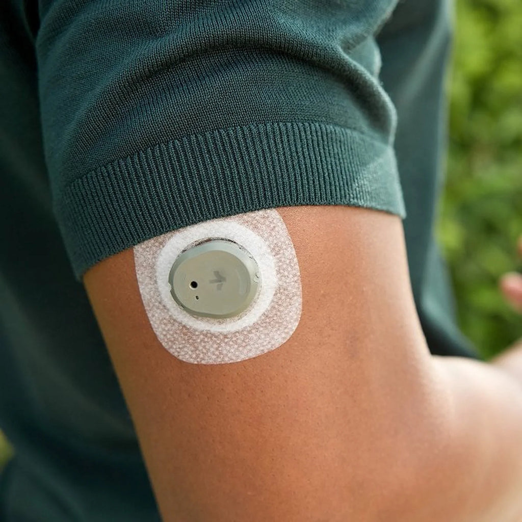 Dexcom Stelo continuous glucose monitor biosensor worn on the back of the upper arm