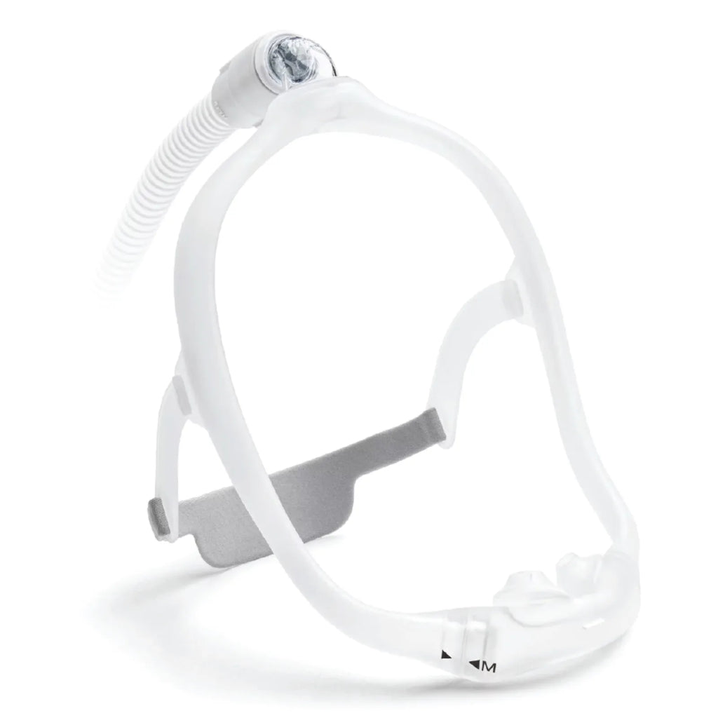 Philips Respironics DreamWear silicone nasal pillow CPAP mask, angled view with top-of-head hose connection