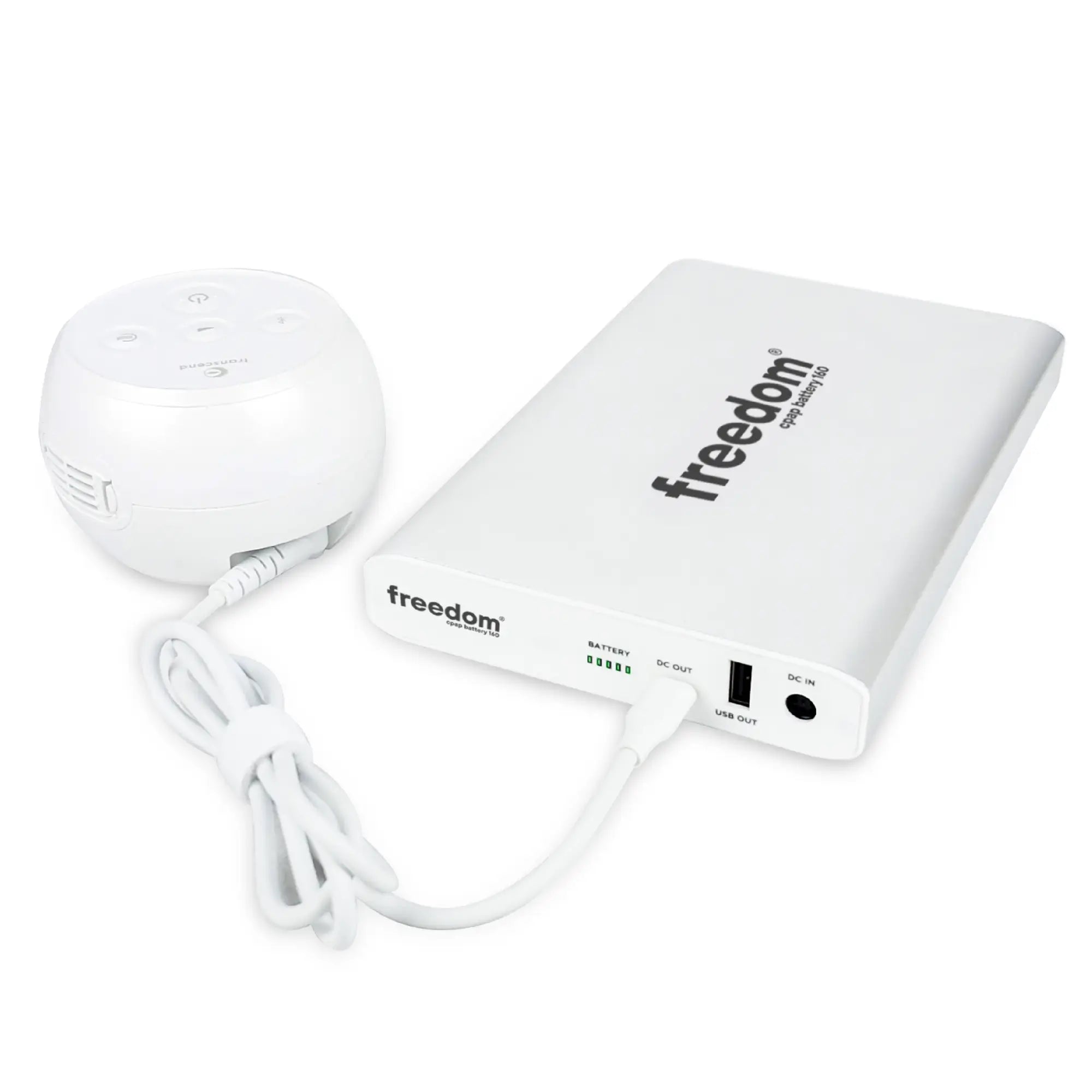 White DC cable connecting a Transcend Micro travel CPAP machine to a Freedom V2 CPAP battery