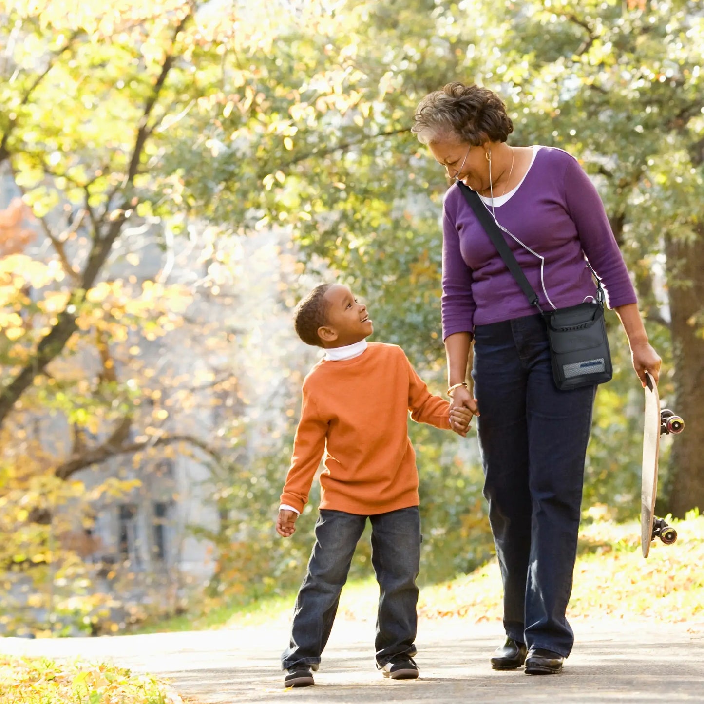 woman walking and using the Inogen Rove 6 Portable Oxygen Concentrator