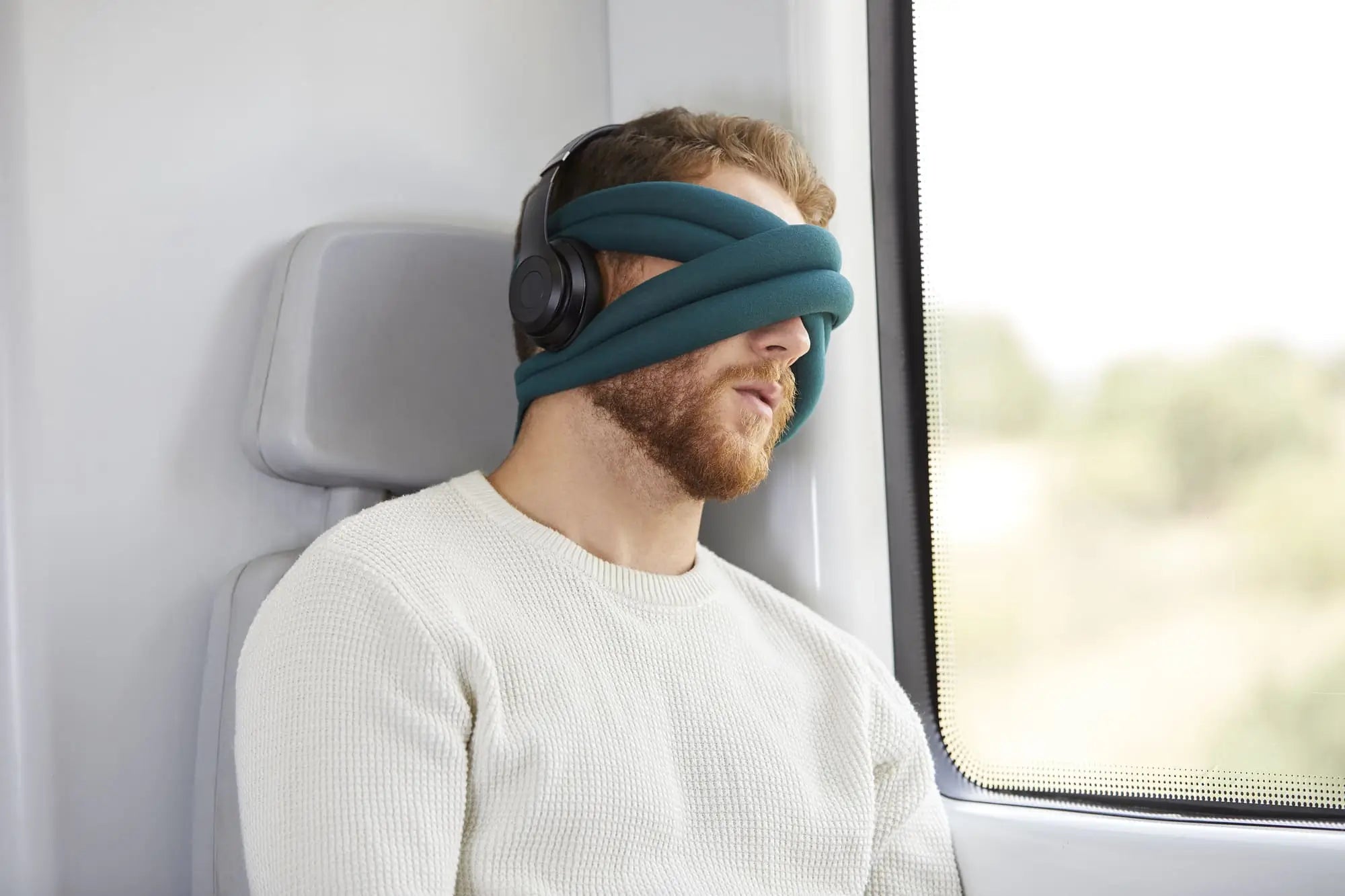 man sleeping with the Loop Eye Pillow