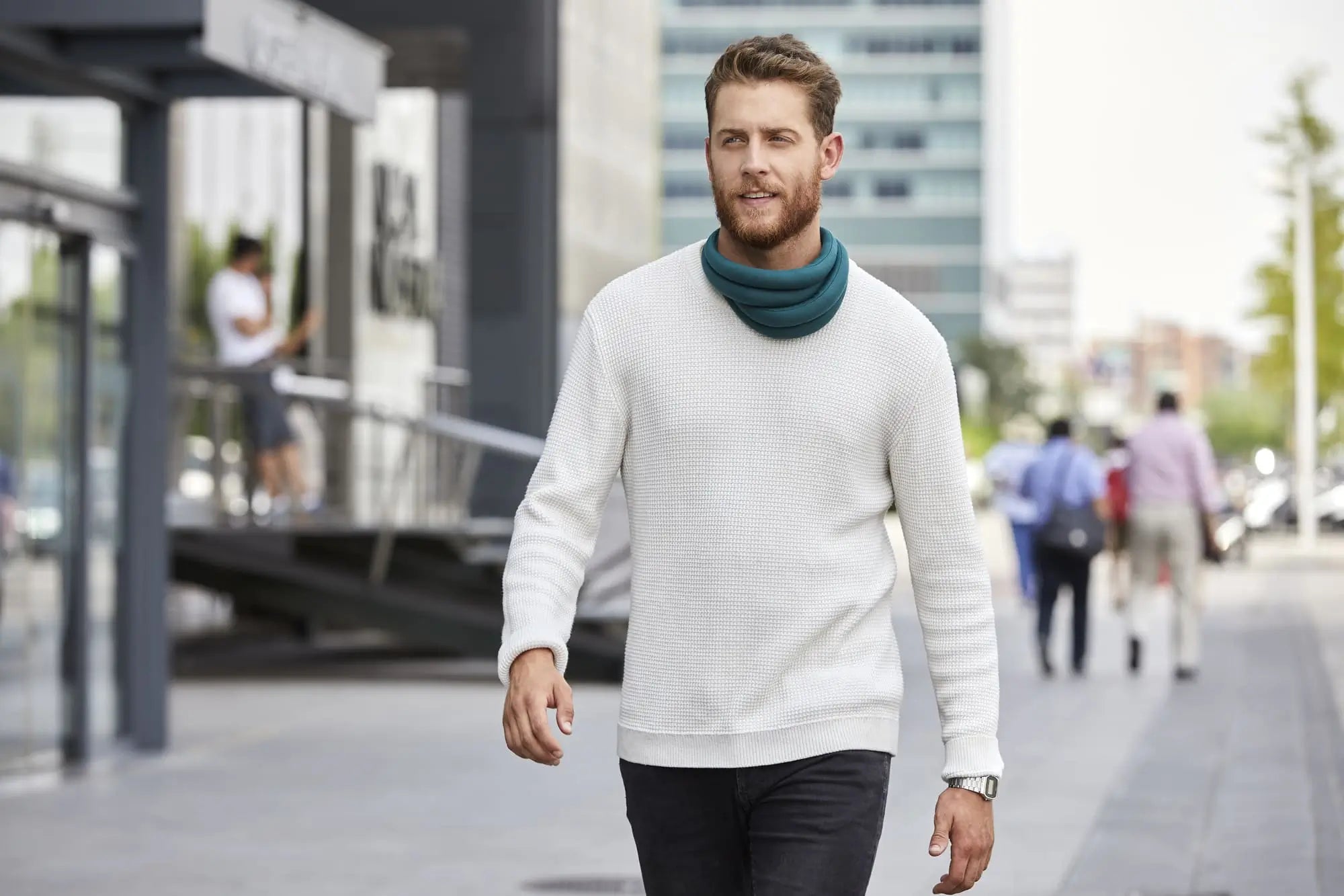 man using the Loop Eye Pillow in his neck