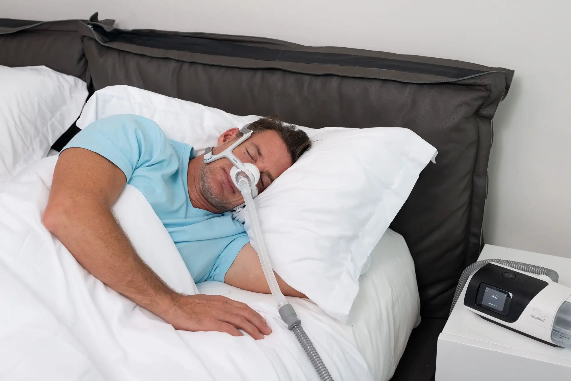 man using the cpap mask Liner while sleeping