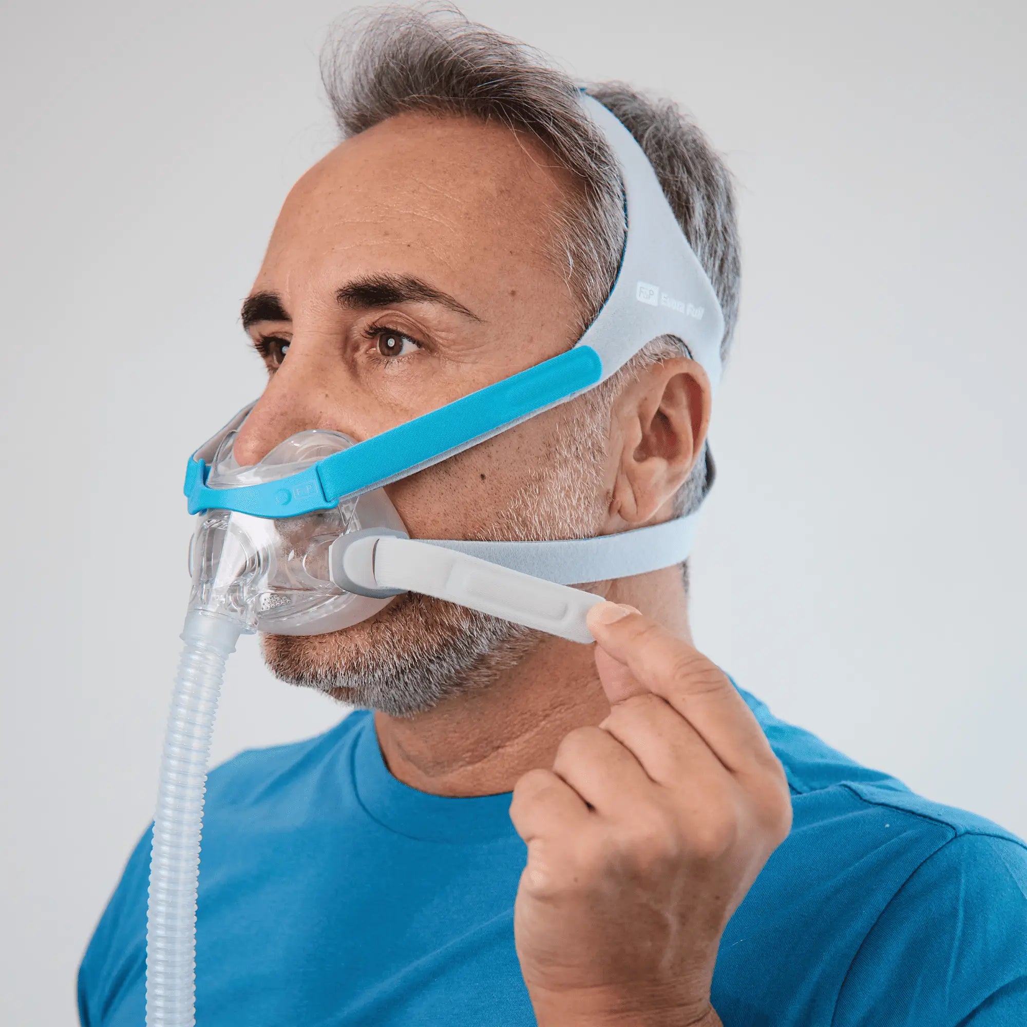 man using the Fisher & Paykel Evora™ Full Face CPAP Mask with Headgear Side View