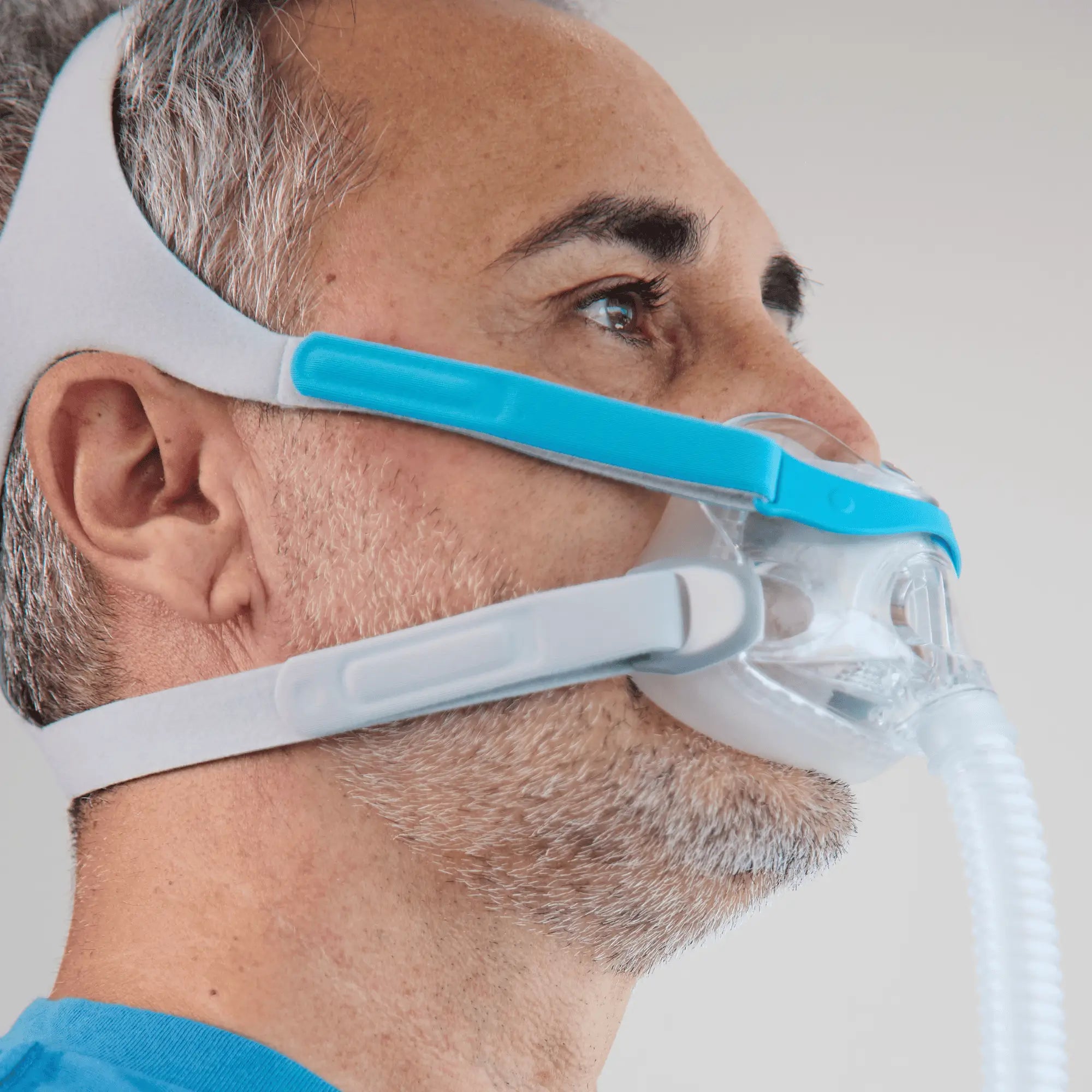 man using the Fisher & Paykel Evora™ Full Face CPAP Mask with Headgear Side View