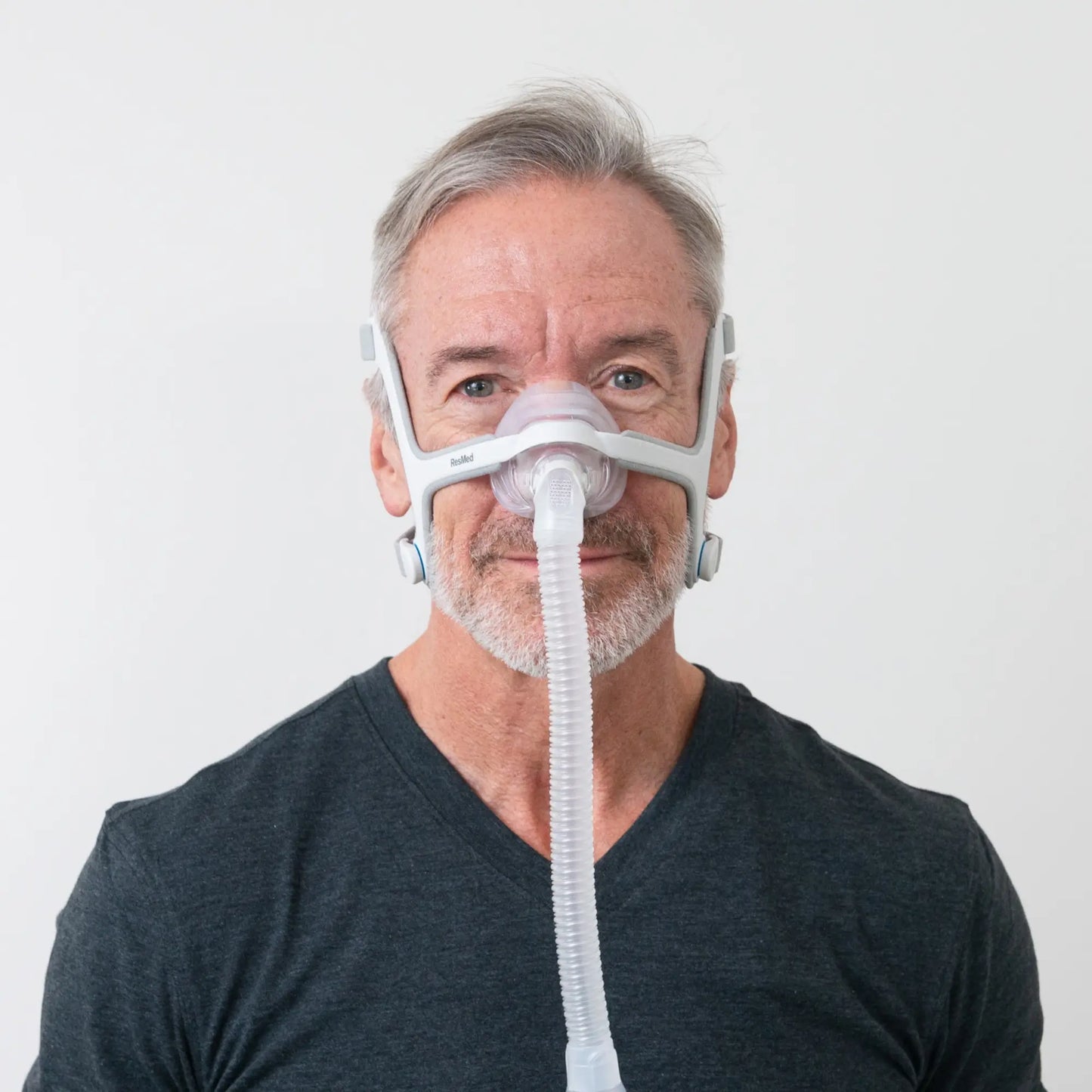 man using the ResMed AirFit N20 Nasal CPAP Mask with Headgear front view