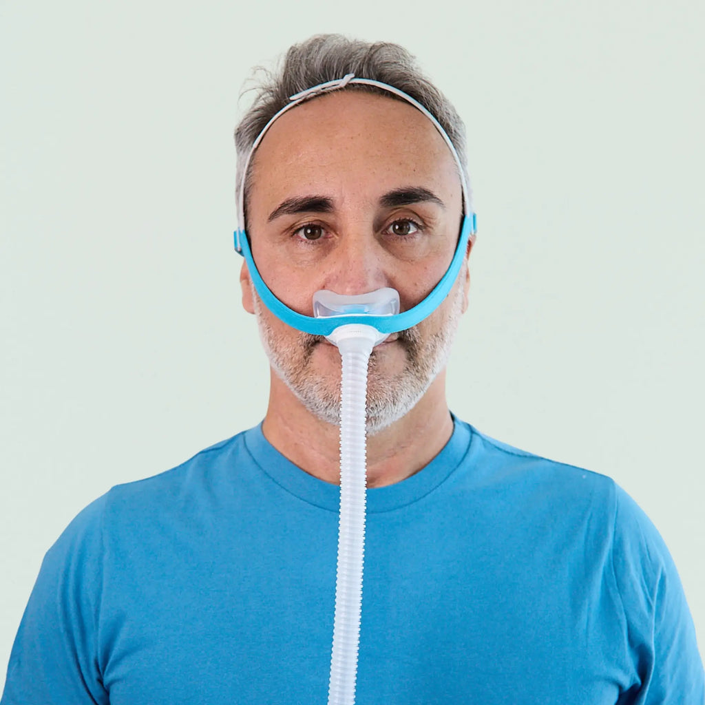 man wearing the Evora Nasal CPAP Mask from view