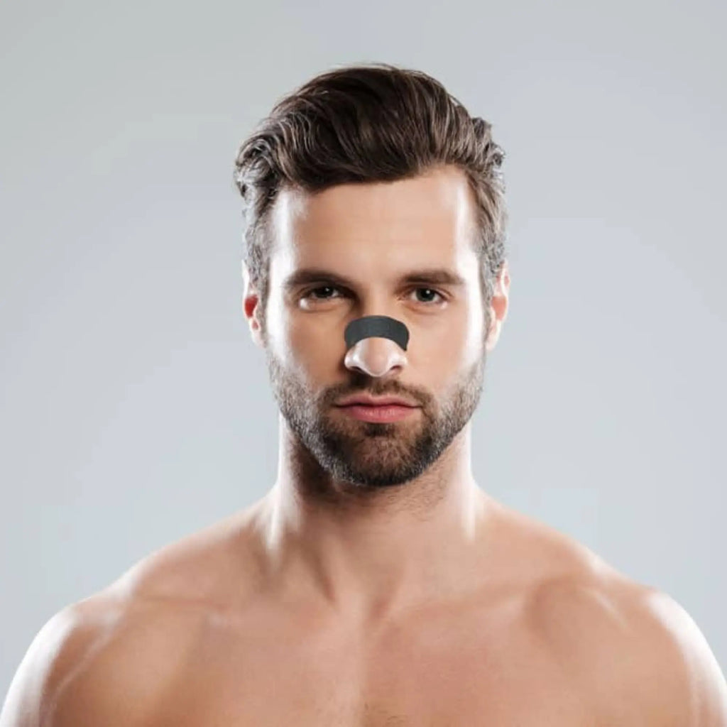man wearing RemSleep Advanced Nasal Strips for Snoring