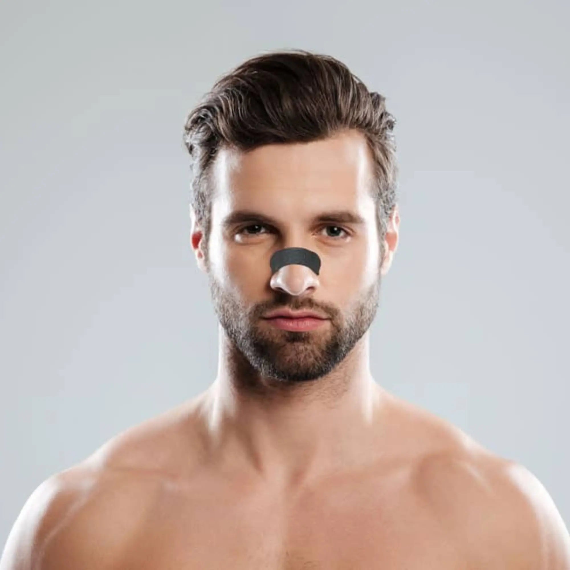 man wearing RemSleep Advanced Nasal Strips for Snoring
