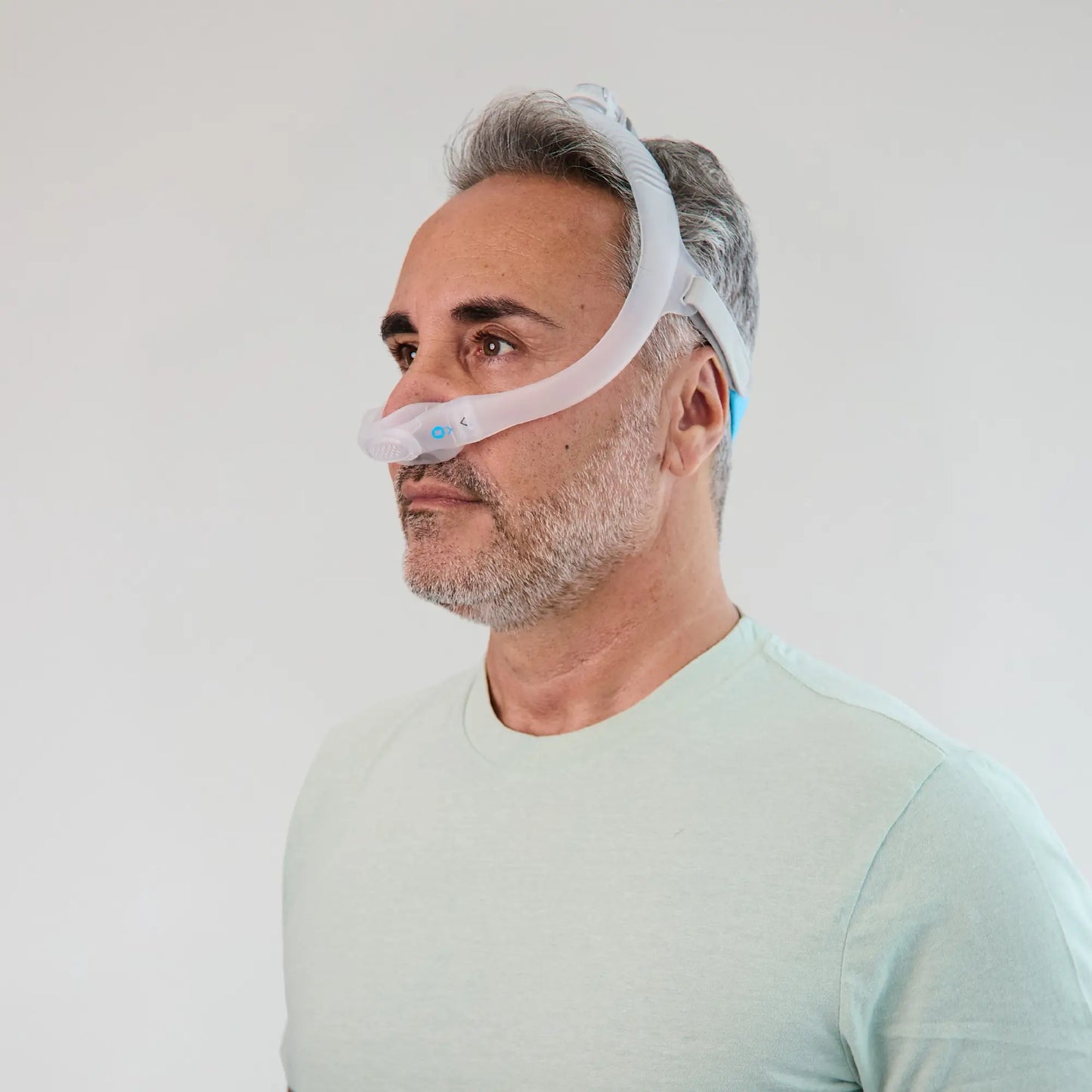 man wearing ResMed AirFit N30i Nasal Mask side front view