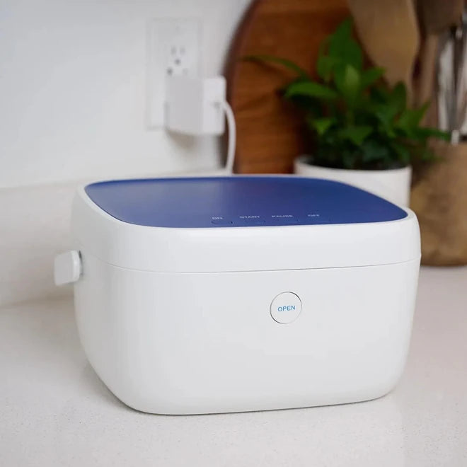 Paptizer 360 CPAP sanitizer set up on a home bathroom counter