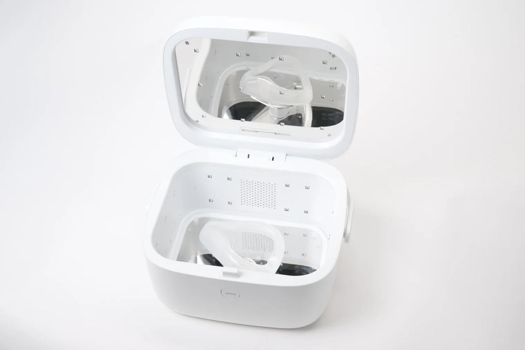 Paptizer 360 open, showing the UVC LED array and a CPAP mask cushion on the tray
