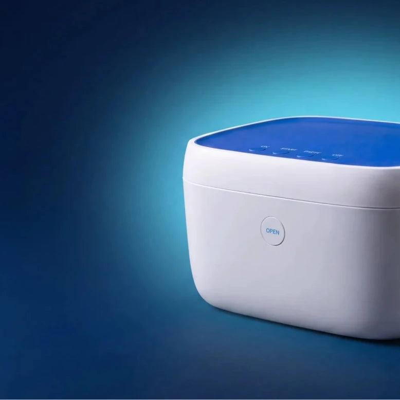 Liviliti Paptizer 360 UVC CPAP sanitizer lit on a dark blue background