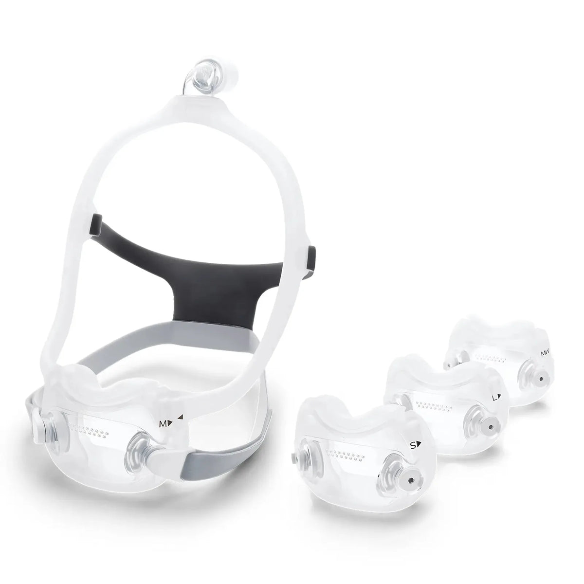 DreamWear full face CPAP mask assembled with headgear beside three additional cushion sizes