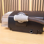 Back view of CPAP machine showing ClimateLineAir heated tube cuff seated in the round air outlet