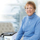 woman using the OxyHome Stationary Oxygen Concentrator at home