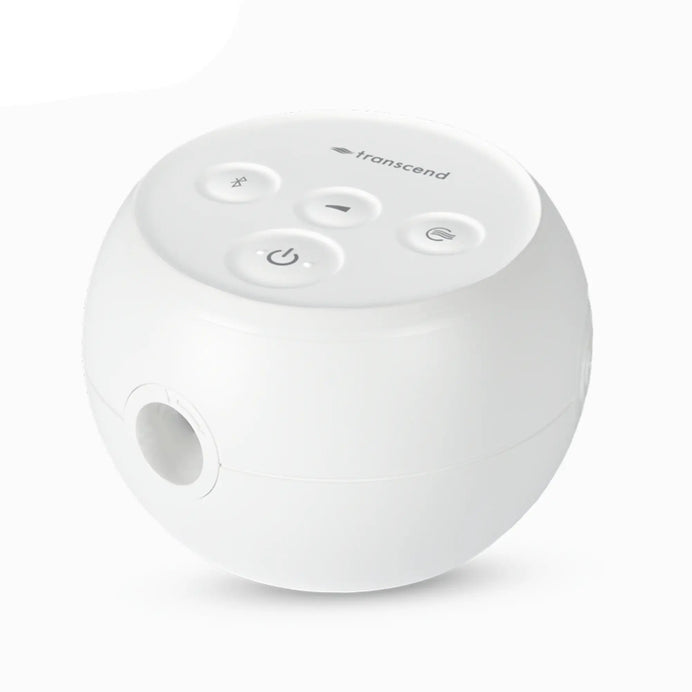 Transcend Micro 510 travel CPAP in birch white, side-angle view showing rounded form and hose connection port