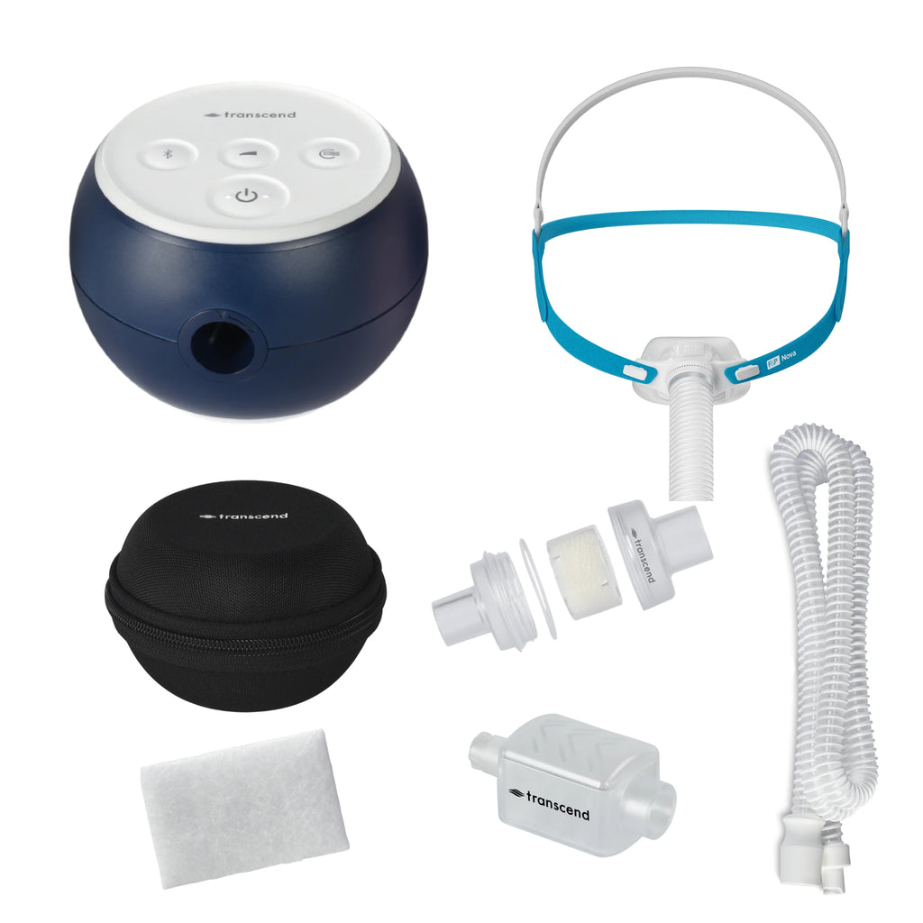 Transcend Micro 510 travel CPAP bundle with F&P Nova Micro nasal pillow mask, black round hard-shell travel case, slim coiled hose, inline HME canister, filter, and connector adapters