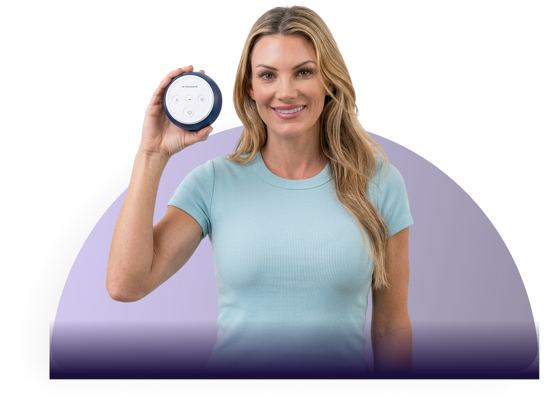Woman holding the Transcend Micro 510 travel CPAP in midnight blue