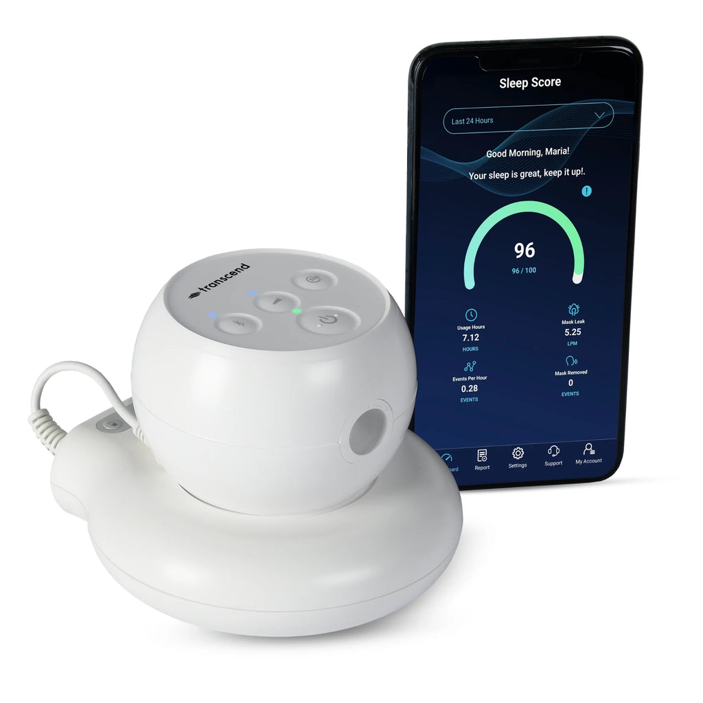 Transcend Micro travel CPAP on PowerAway battery base beside smartphone showing sleep-tracking app and sleep score