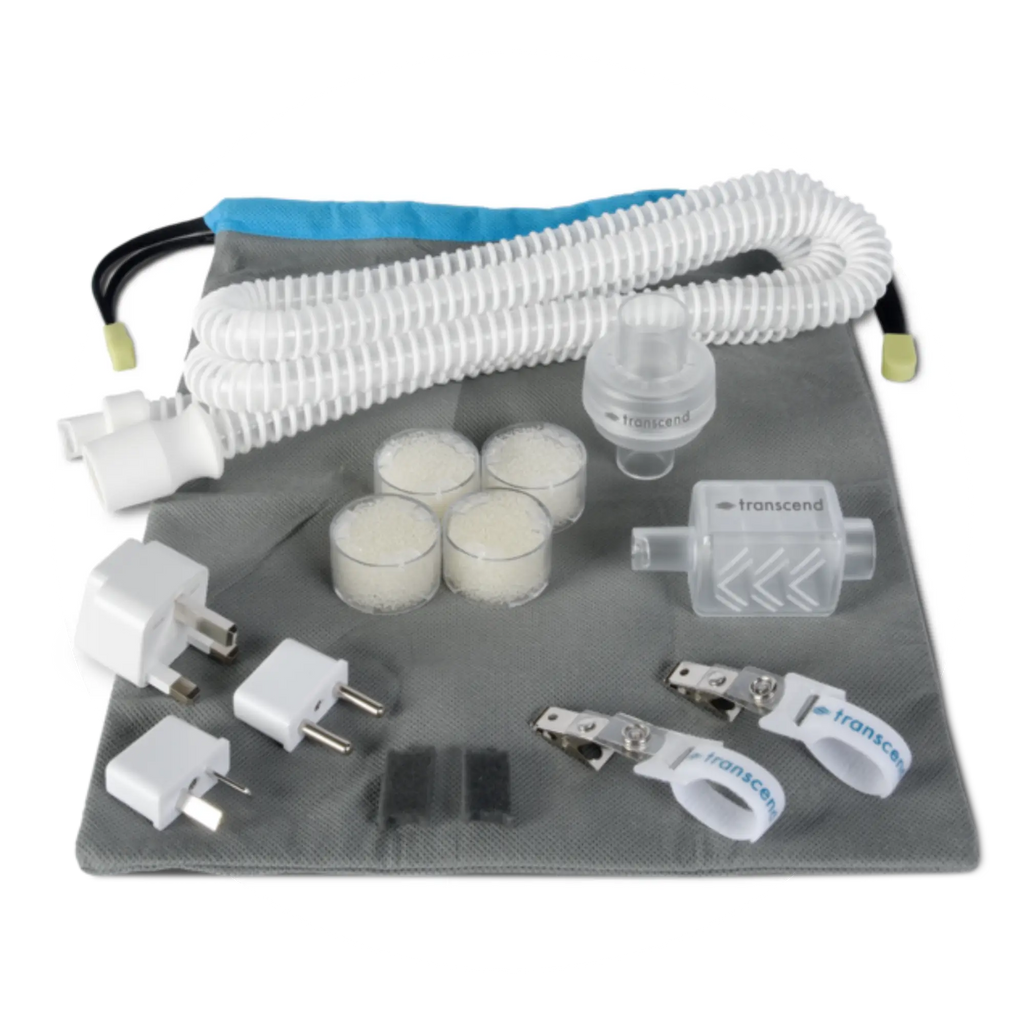 Transcend Micro accessory kit laid out: air hose, four filters, plug adapters, and hose clips