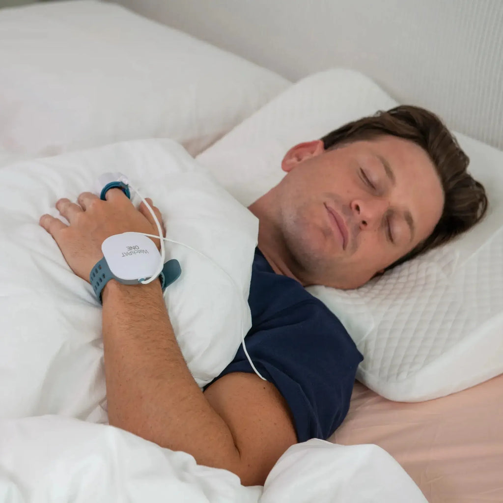 Young Man using WatchPat One for Sleep Apnea Test