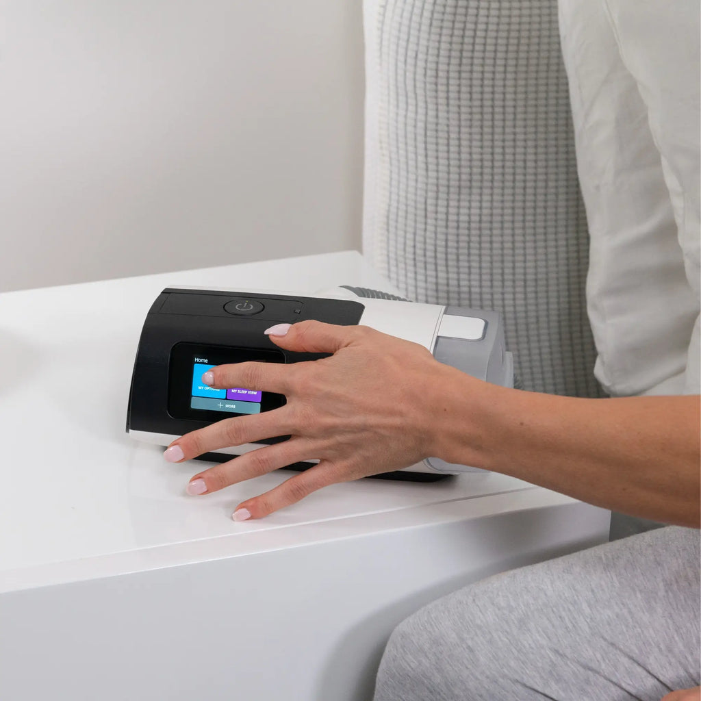 woman Setting up the ResMed AirSense 11 AutoSet CPAP Machine