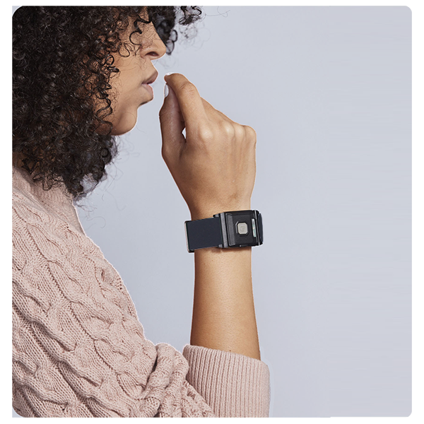 woman using TouchPoints with Wristbands – Wearable Device for Stress